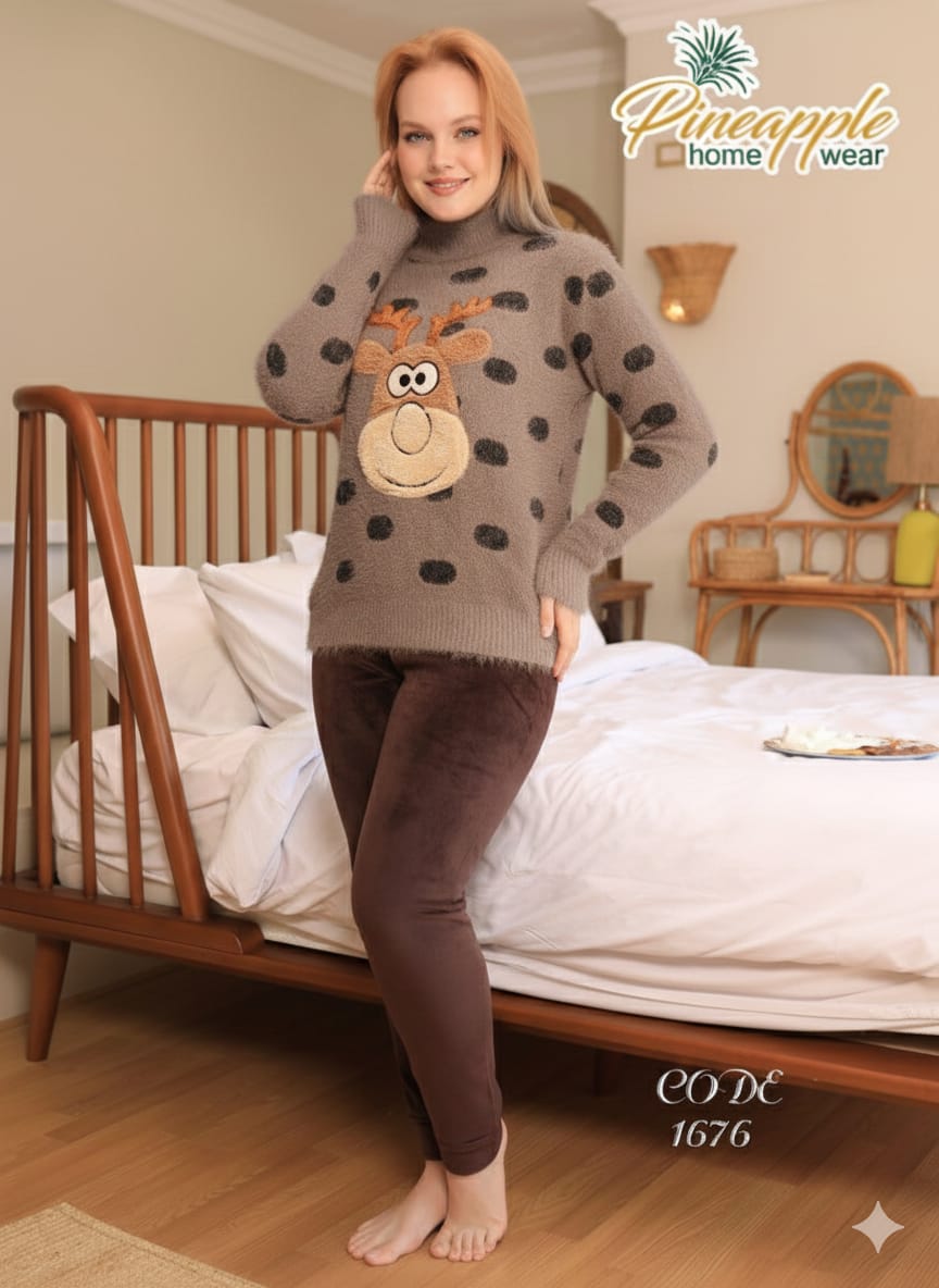 Woman wearing a brown sweater with a reindeer design in a bedroom setting, branded 'Pineapple Home Wear'.