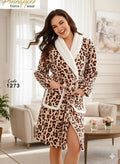 Woman wearing a leopard print robe with white trim in a living room setting.