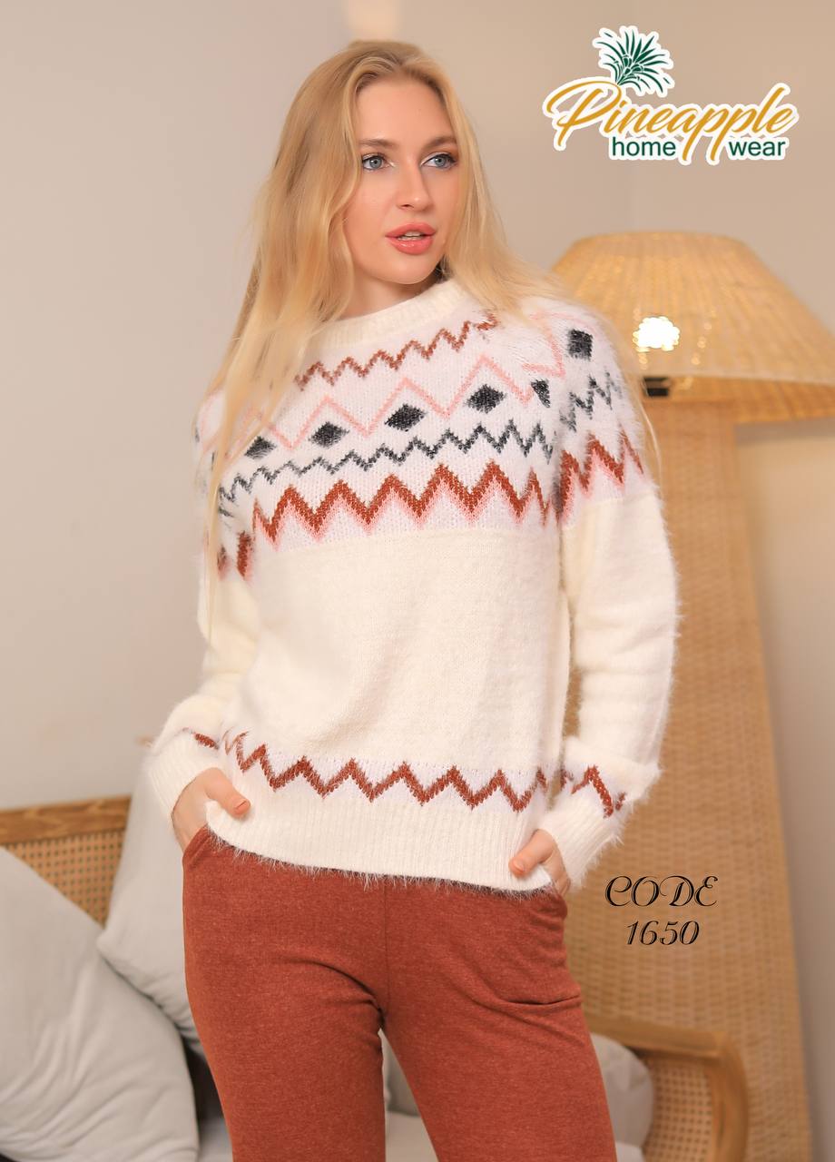 Woman wearing a patterned sweater with 'Pineapple Home Wear' branding.