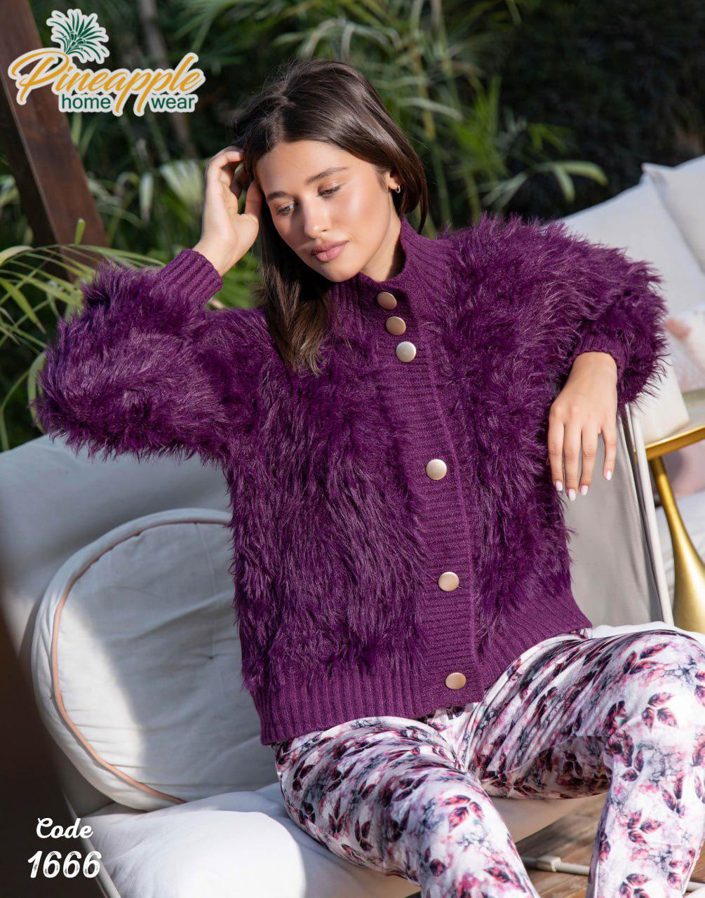Woman wearing a purple fluffy cardigan sitting outdoors with 'Pineapple Home Wear' branding.