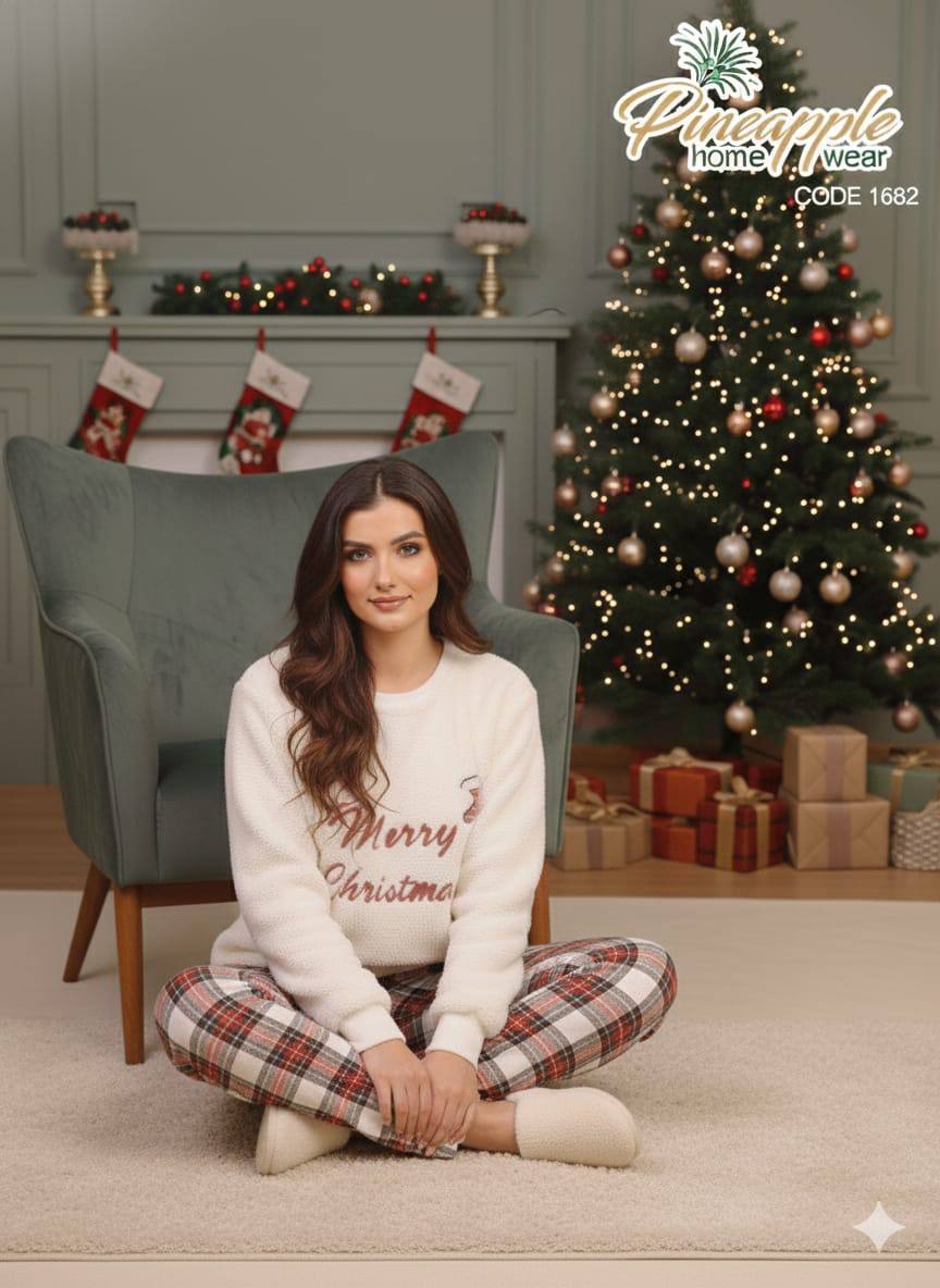 Woman sitting on a chair in a festive living room with Christmas decorations and 'Pineapple Home Wear' branding.