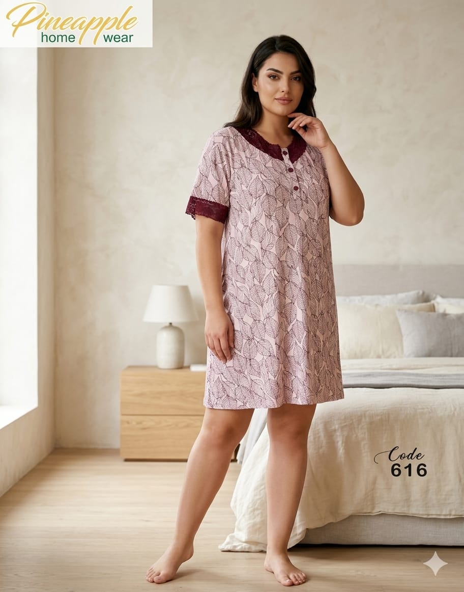 Woman wearing a pink lace nightgown in a bedroom setting with 'Pineapple Home Wear' branding.