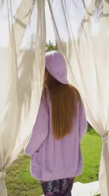 young woman modeling a purple loungewear set from the brand "Pineapple home wear"